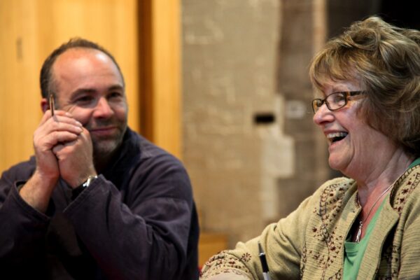 A man and a woman chatting